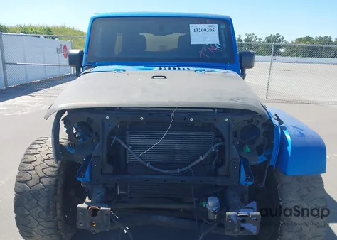 2015 Jeep Wrangler Unlimited Sahara из США, поврежденный, VIN 1C4BJWEG9FL765245